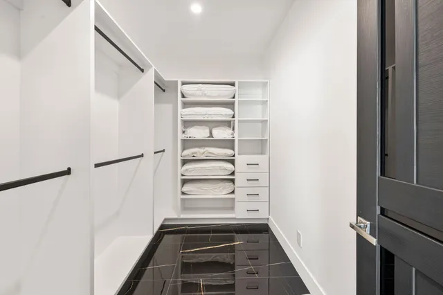 a living room with fireplace furniture and a flat screen tv