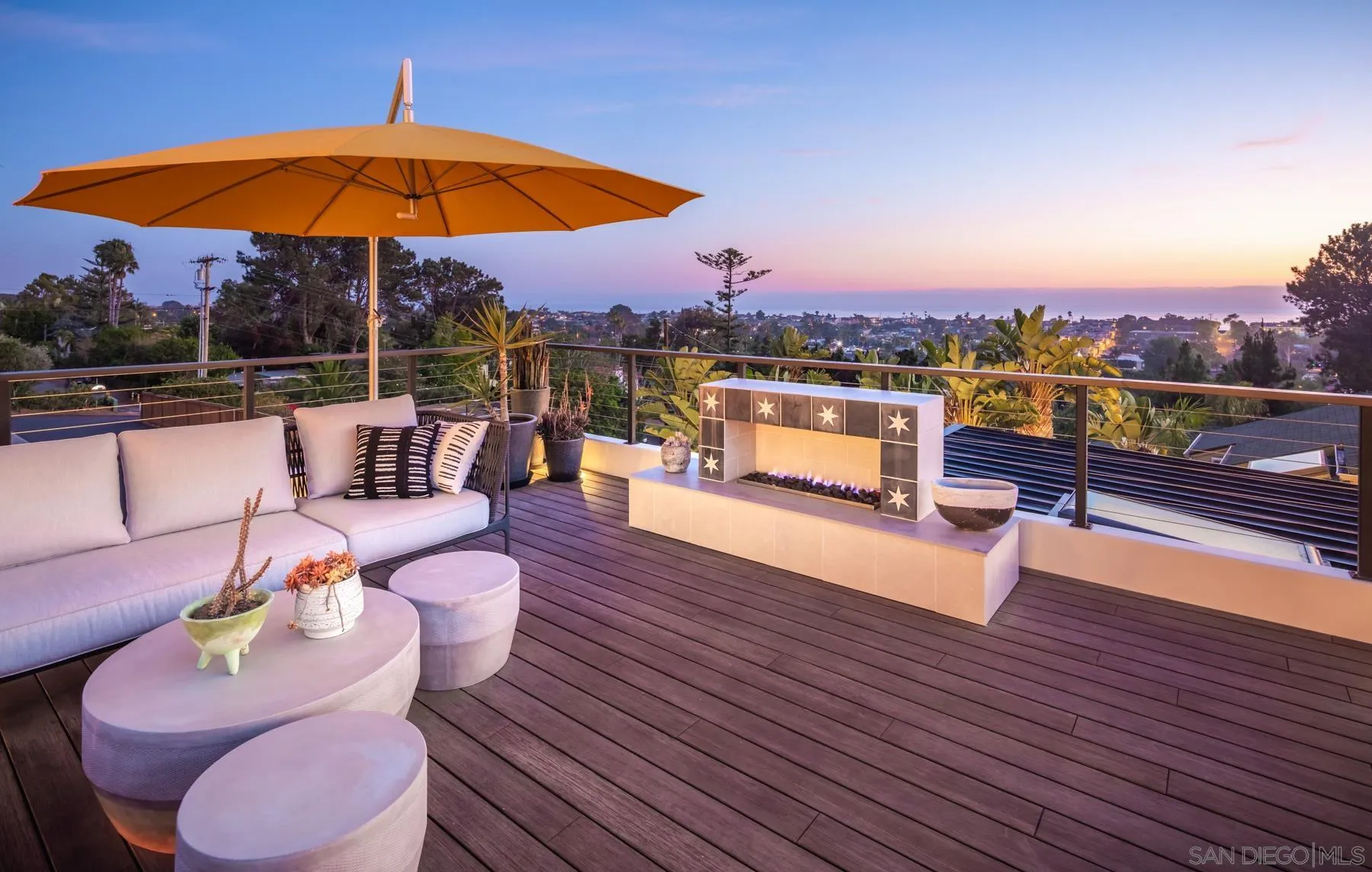 303 Hillcrest Drive Encinitas, CA 92024 - Photo 1 of 28 an outdoor space with patio the couch and chairs