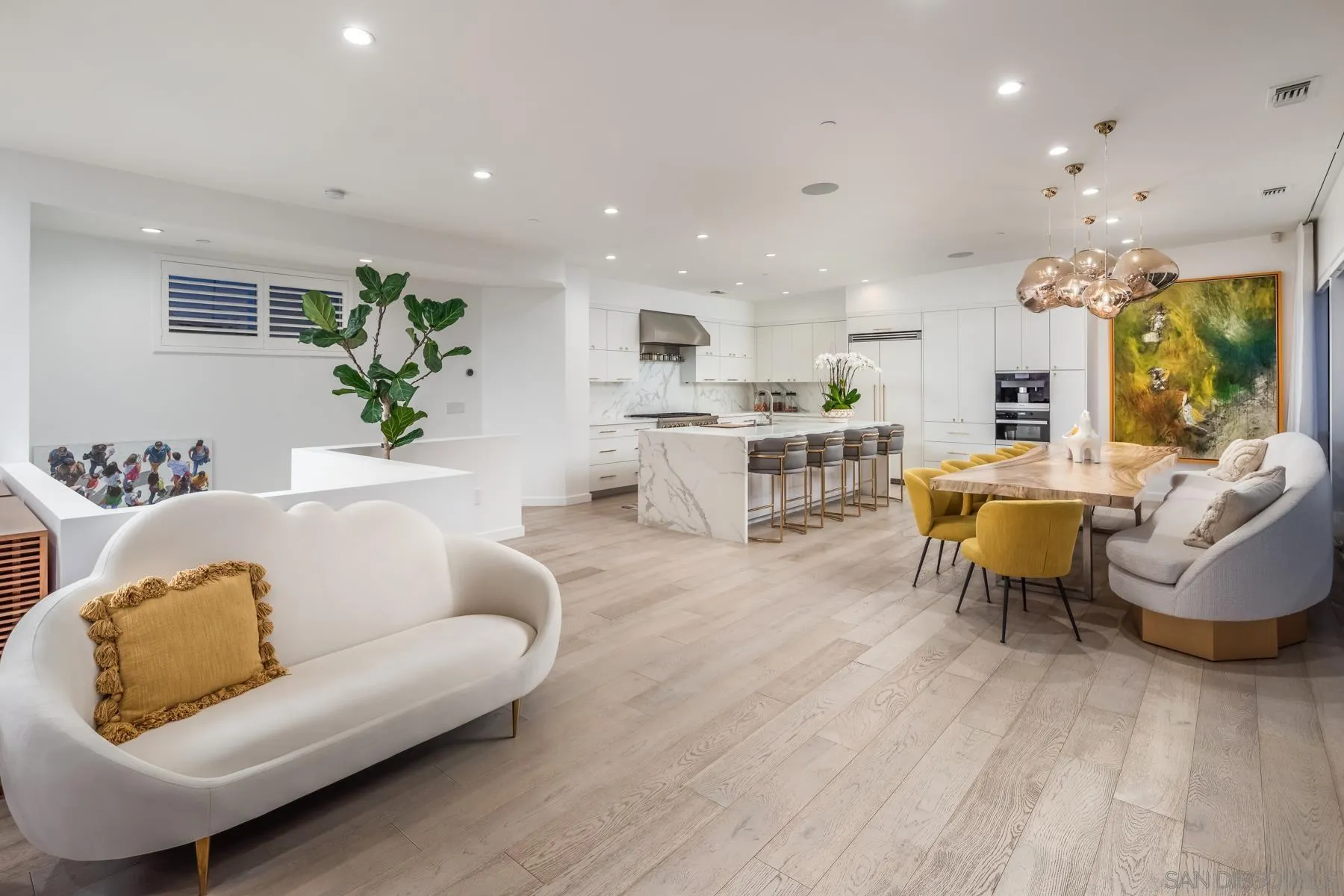 303 Hillcrest Drive Encinitas, CA 92024 - Photo 11 of 28 a living room with furniture and a large window