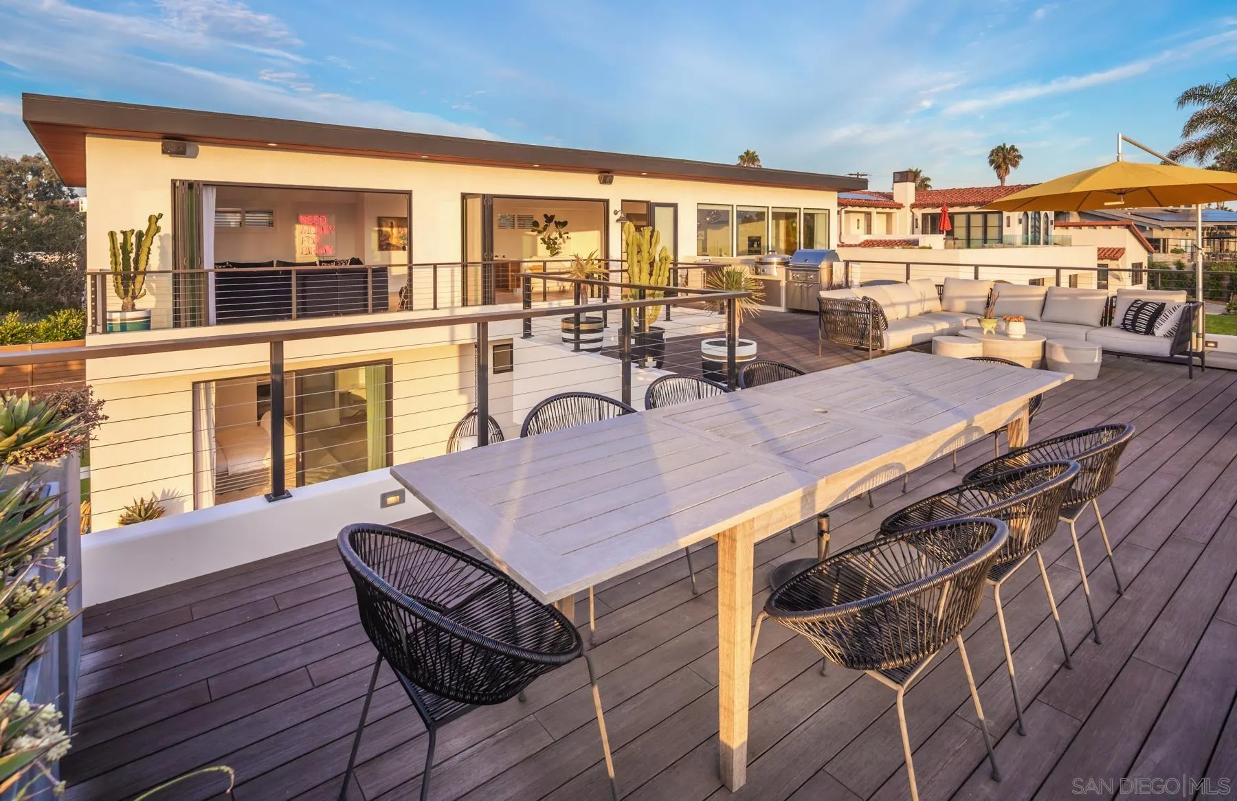 303 Hillcrest Drive Encinitas, CA 92024 - Photo 6 of 28 a view of a dining room with furniture and wooden floor