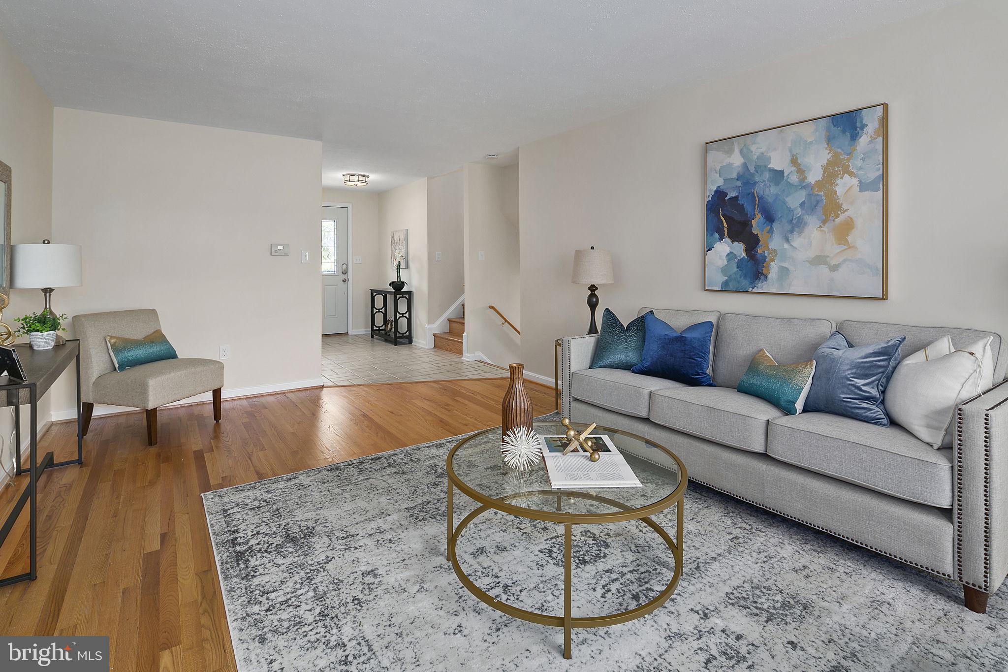 Open Living Space with Refinished Hardwoods