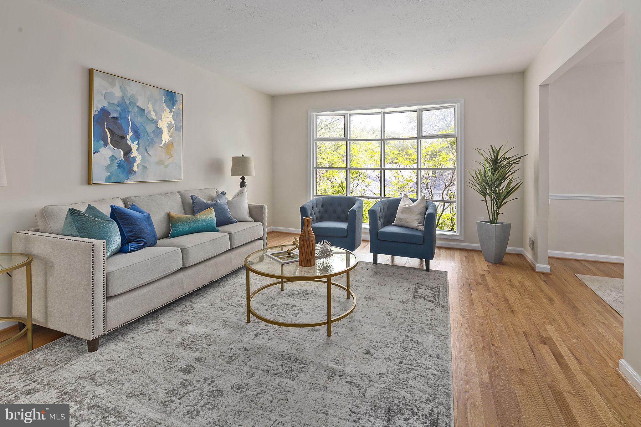 Open Living Space with Refinished Hardwoods