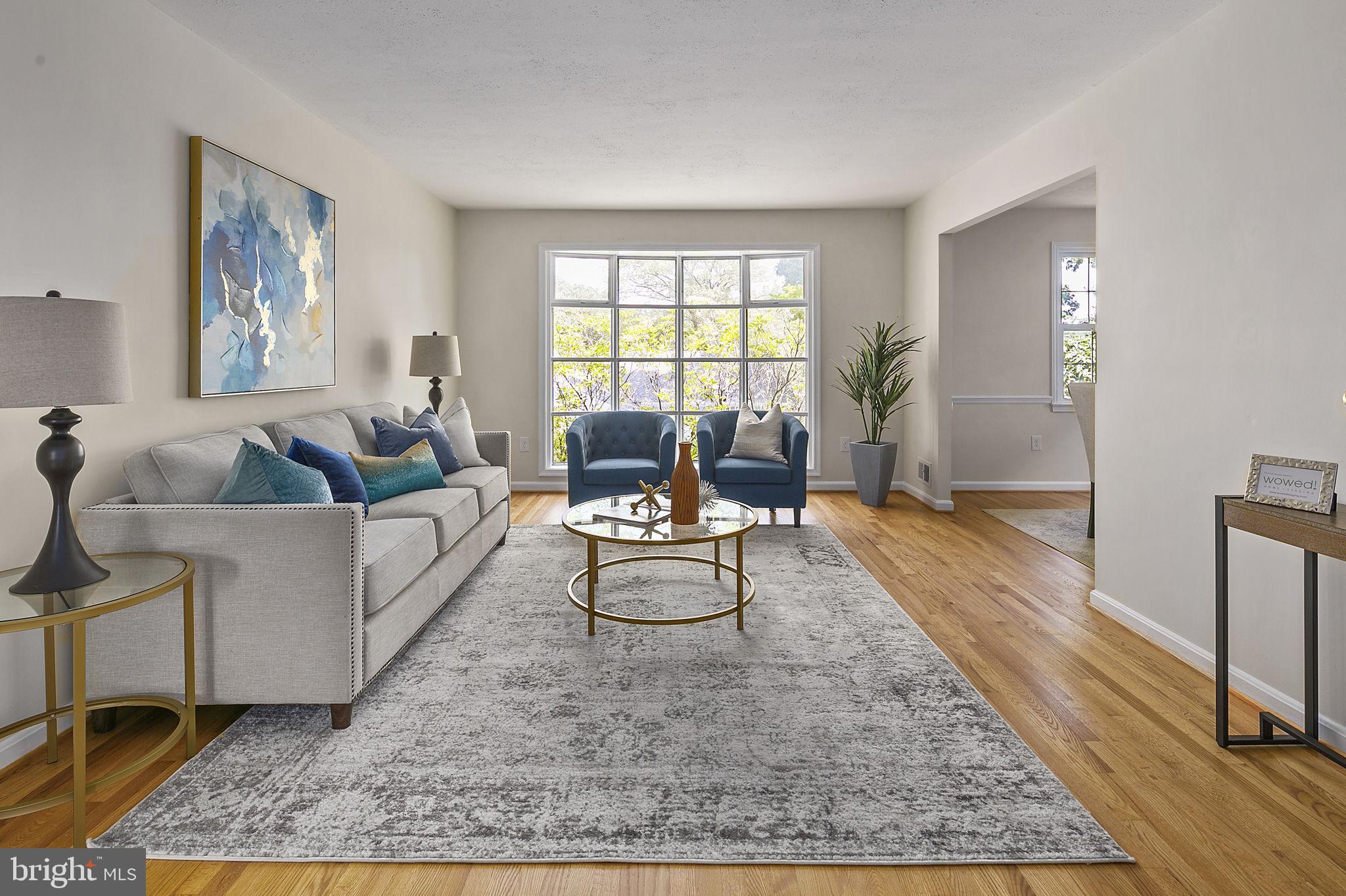 Open Living Space with Refinished Hardwoods