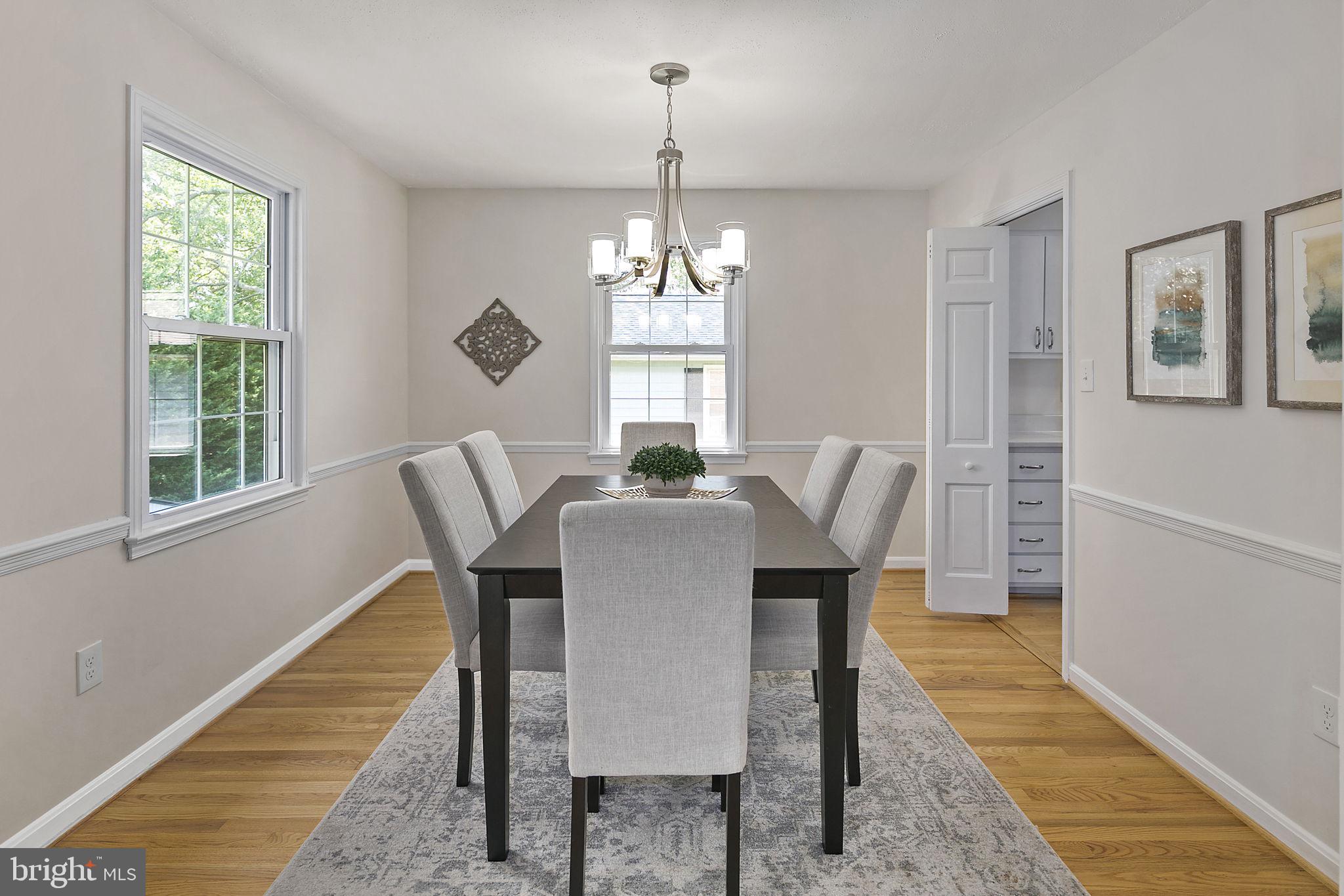 Open Living Space with Refinished Hardwoods