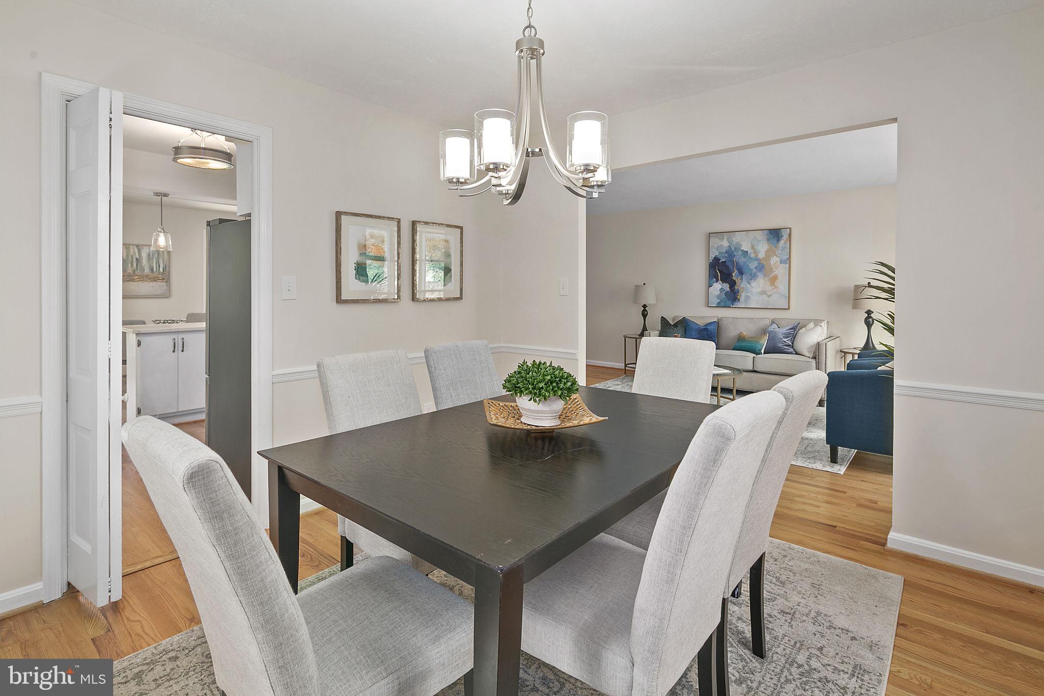Open Living Space with Refinished Hardwoods