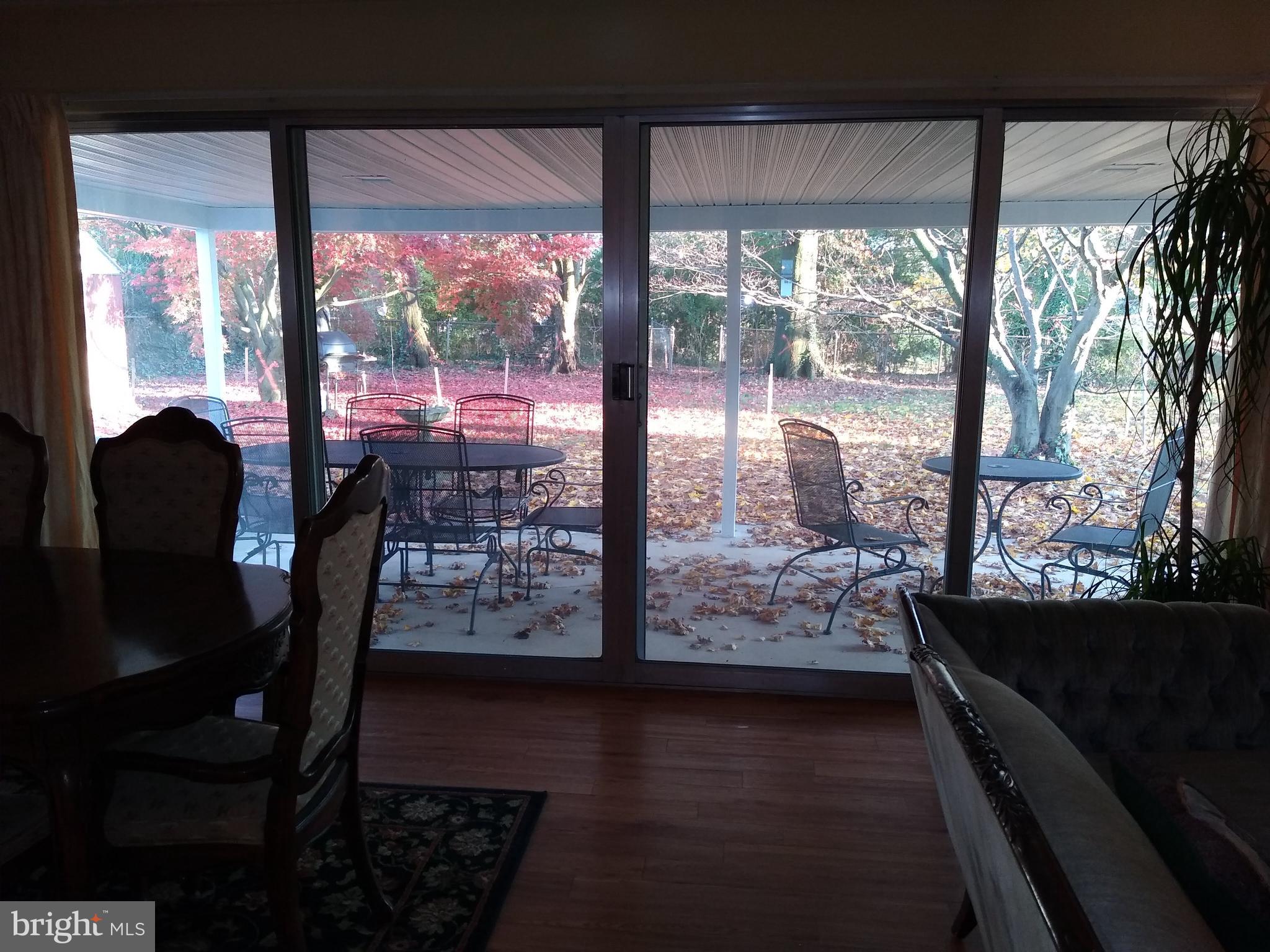 14 Hamlet Road Levittown, PA 19056 - Photo 15 of 47 Dinning Room with Sliders to Covered Patio