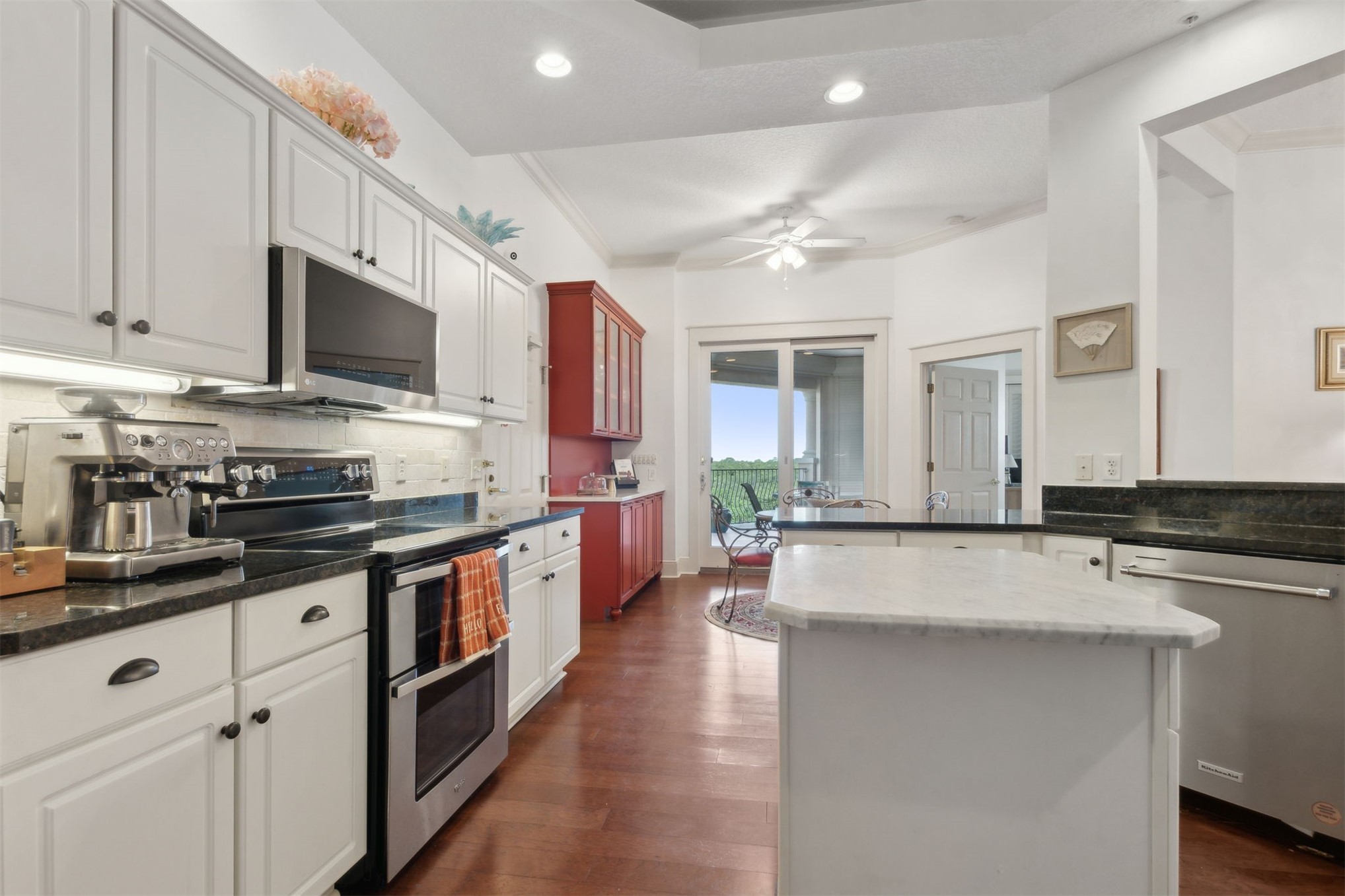 418 Beachside Place, Unit 418 Fernandina Beach, FL 32034 - Photo 19 of 91 a large kitchen with stainless steel appliances granite countertop a lot of counter space and a sink