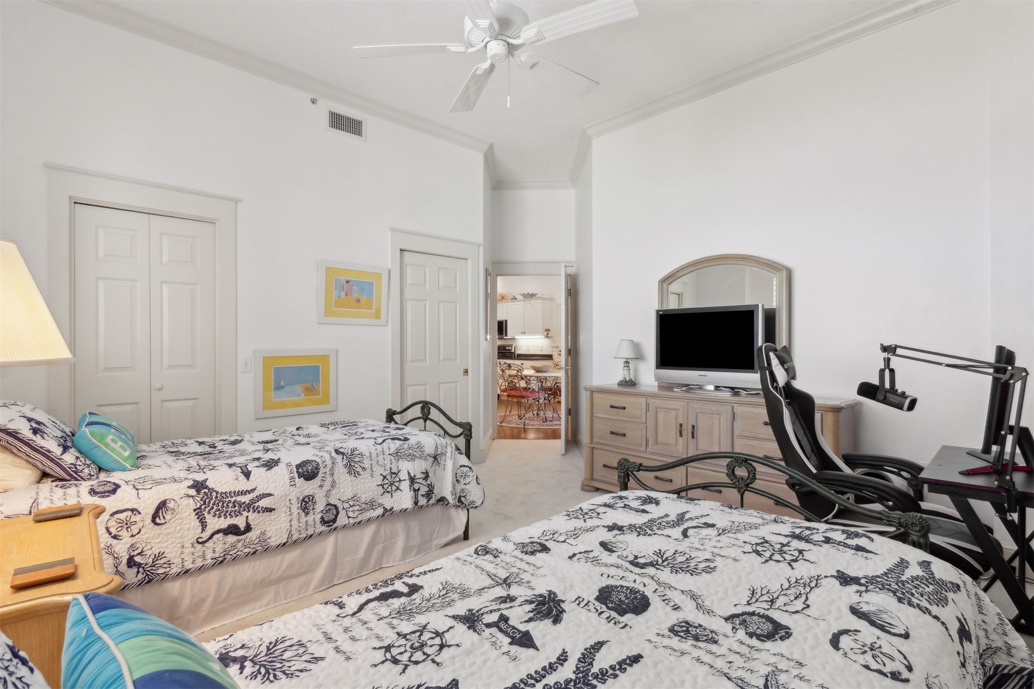 418 Beachside Place, Unit 418 Fernandina Beach, FL 32034 - Photo 36 of 91 a bedroom with a bed and a flat screen tv