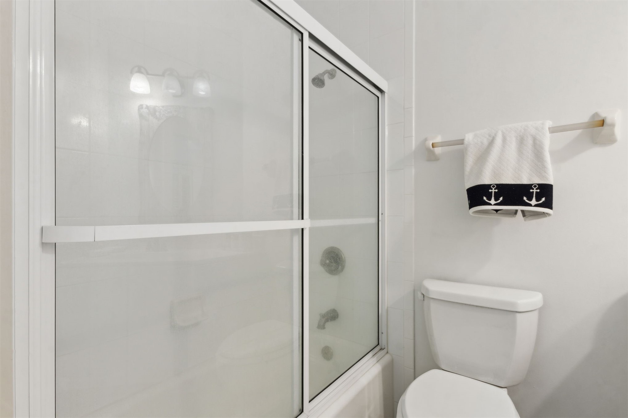 418 Beachside Place, Unit 418 Fernandina Beach, FL 32034 - Photo 40 of 91 a bathroom with a toilet and a shower