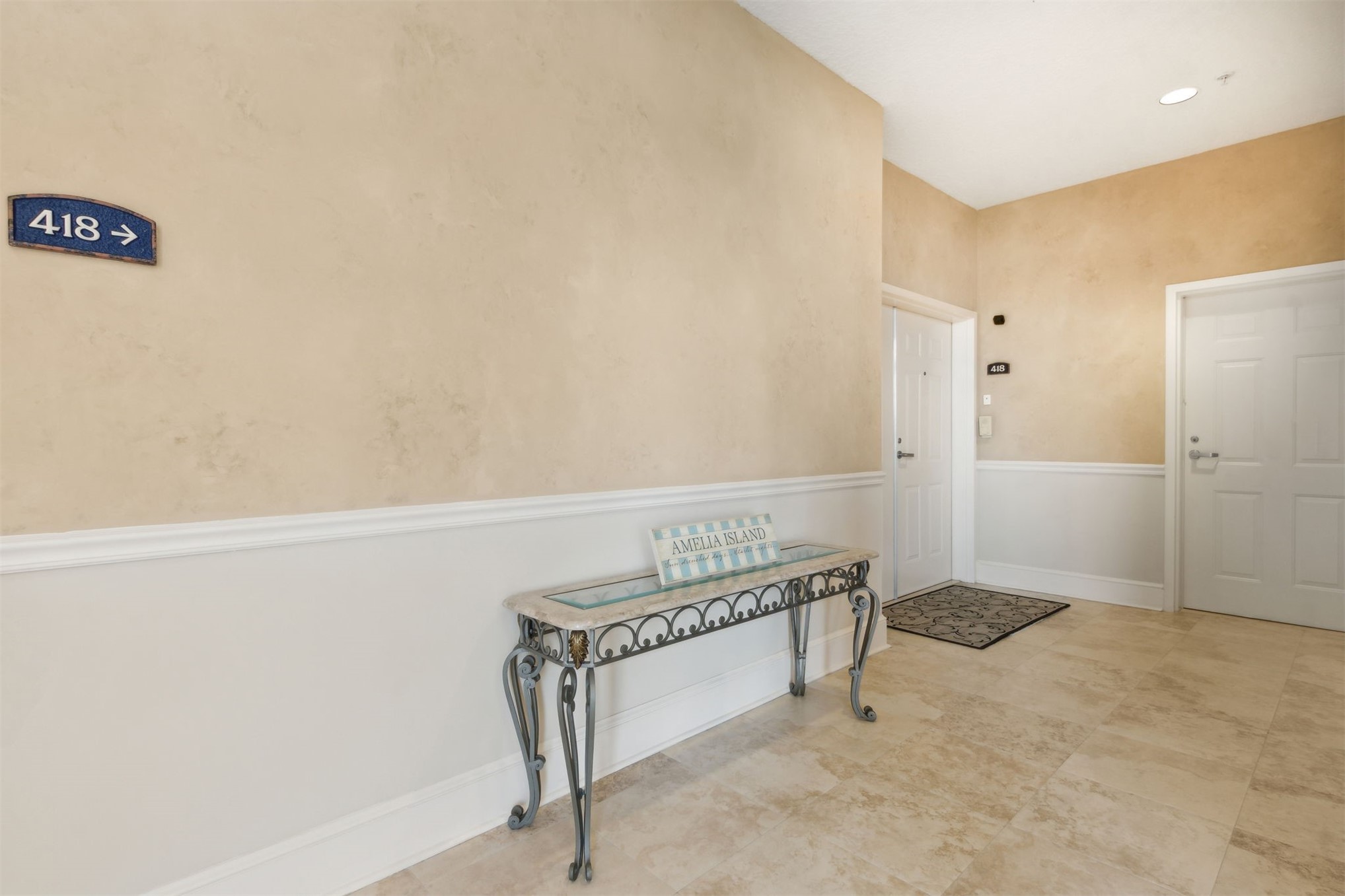 418 Beachside Place, Unit 418 Fernandina Beach, FL 32034 - Photo 4 of 91 a view of a hallway with staircase