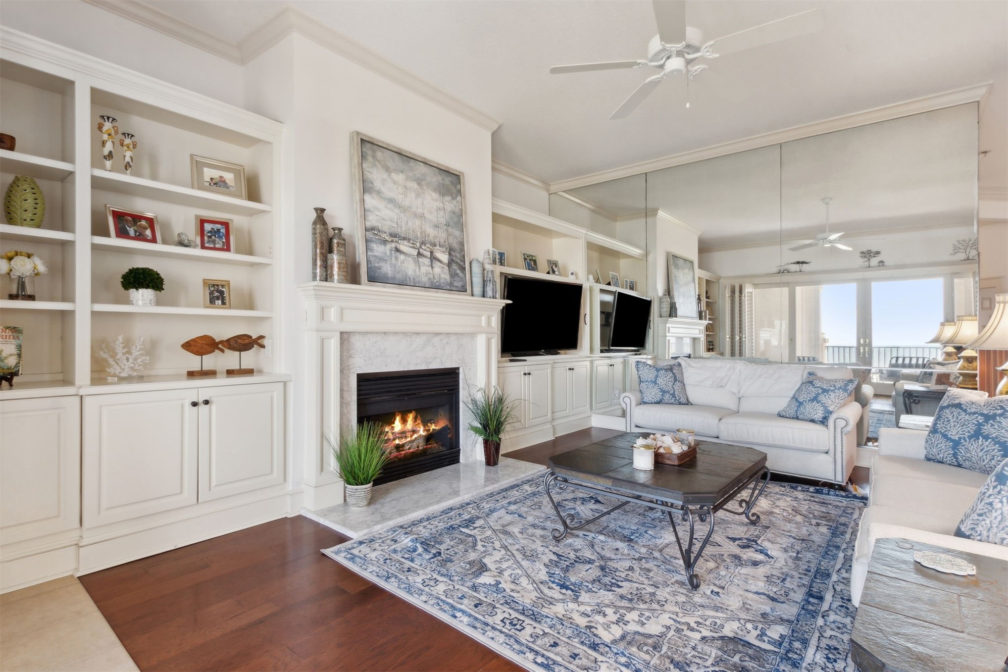 418 Beachside Place, Unit 418 Fernandina Beach, FL 32034 - Photo 7 of 91 a living room with furniture and a fireplace