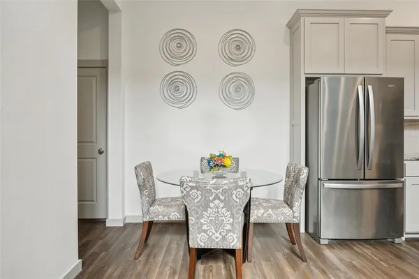 a view of dining room and wooden floor