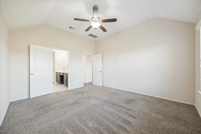 a view of a livingroom with a ceiling fan