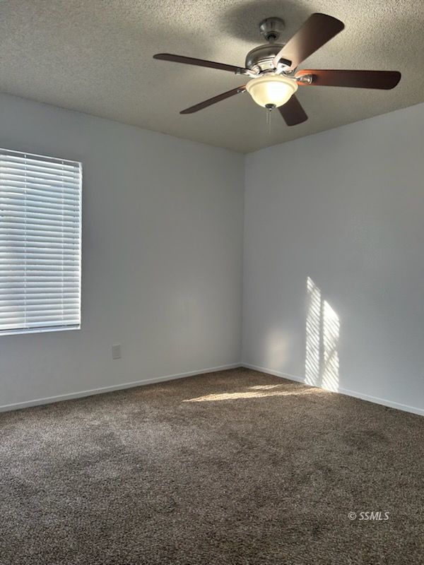 824 C Capehart Court Ridgecrest, CA 93555 - Photo 8 of 11 a view of an empty room with a window