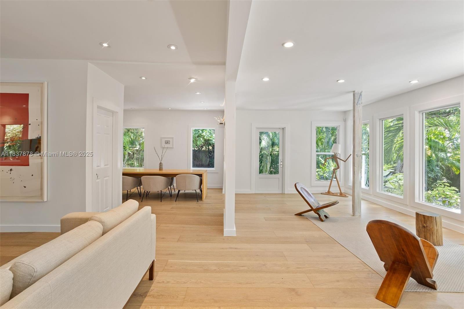 4286 Douglas Road Miami, FL 33133 - Photo 15 of 51 a living room with furniture and a large window