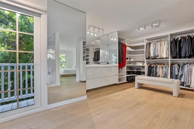 a view of livingroom with furniture and floor to ceiling window