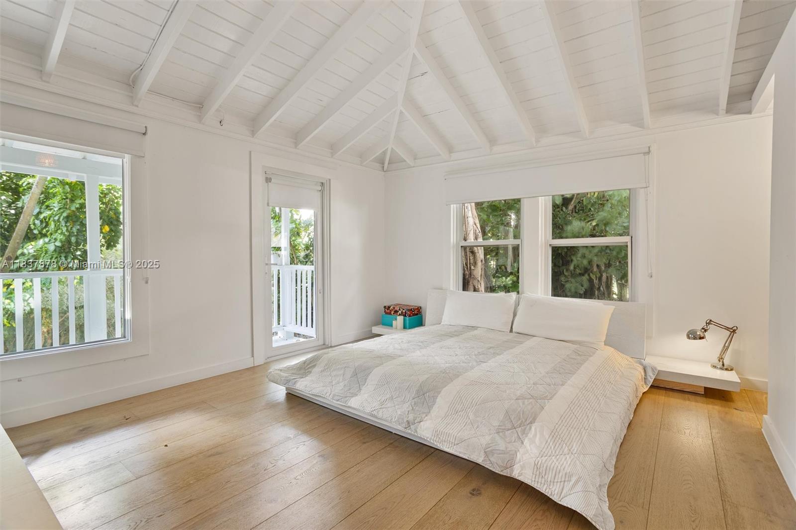 4286 Douglas Road Miami, FL 33133 - Photo 33 of 51 a bedroom with a bed and window