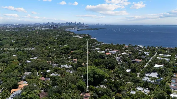 an aerial view of a city with lots of residential buildings