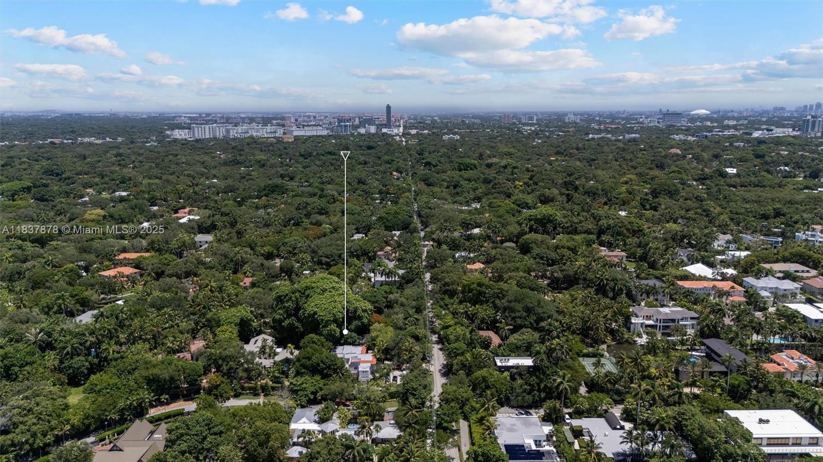 4286 Douglas Road Miami, FL 33133 - Photo 48 of 51 an aerial view of a city with lots of residential buildings