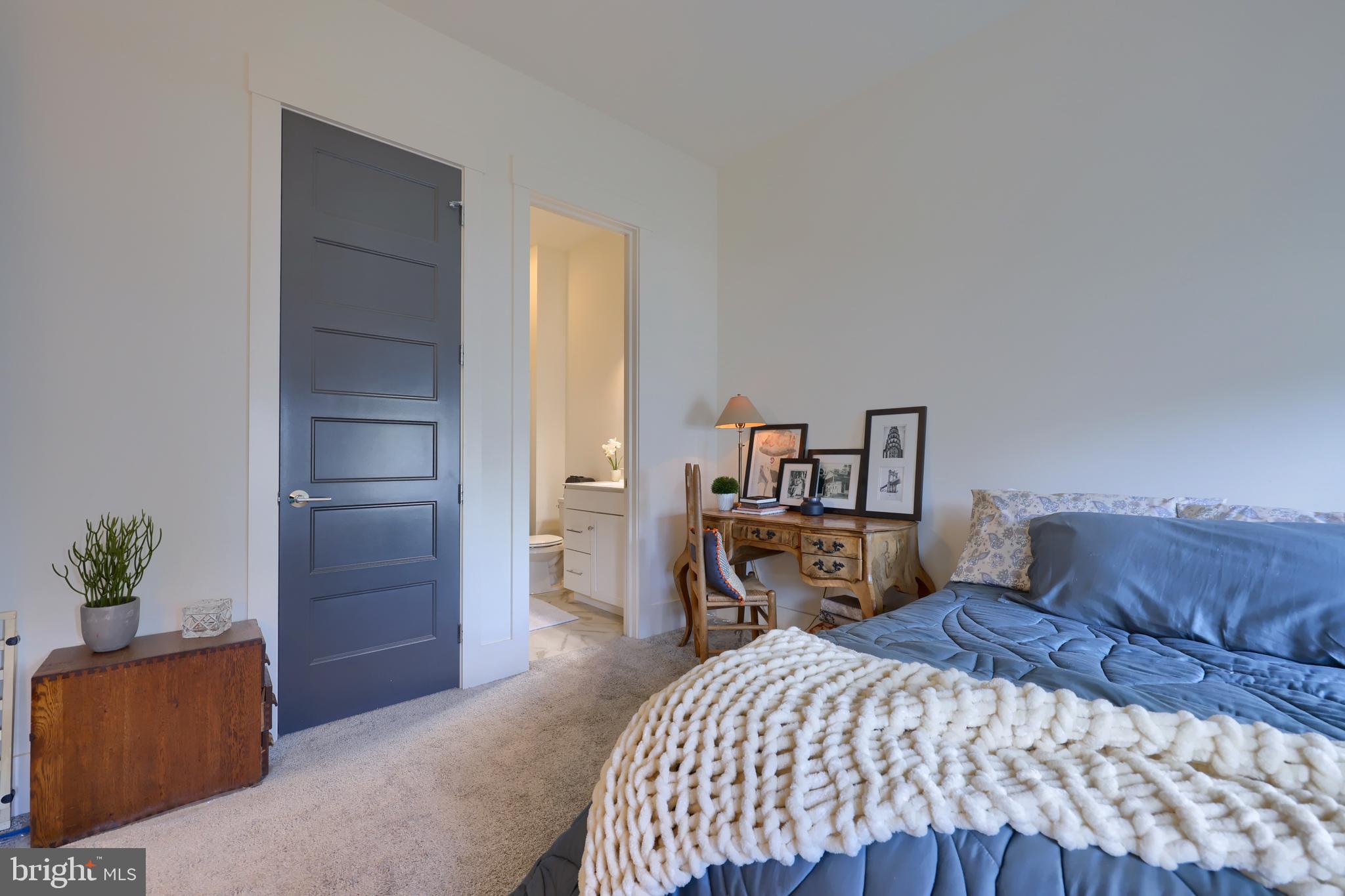 604 Stonehenge Drive Lititz, PA 17543 - Photo 7 of 41 a bedroom with a bed and a dresser