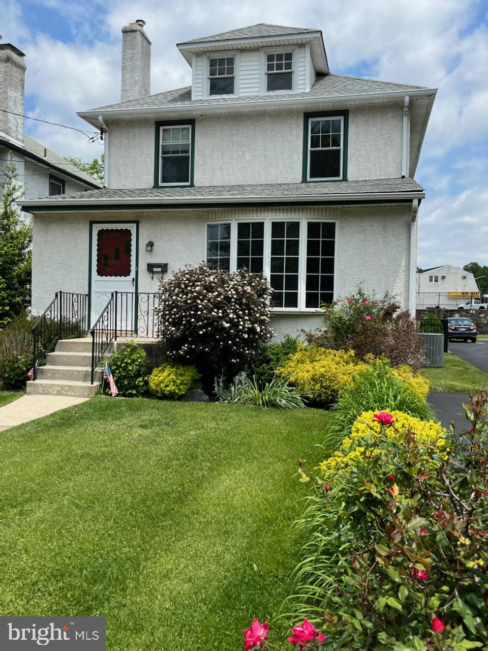 a house view with a garden space