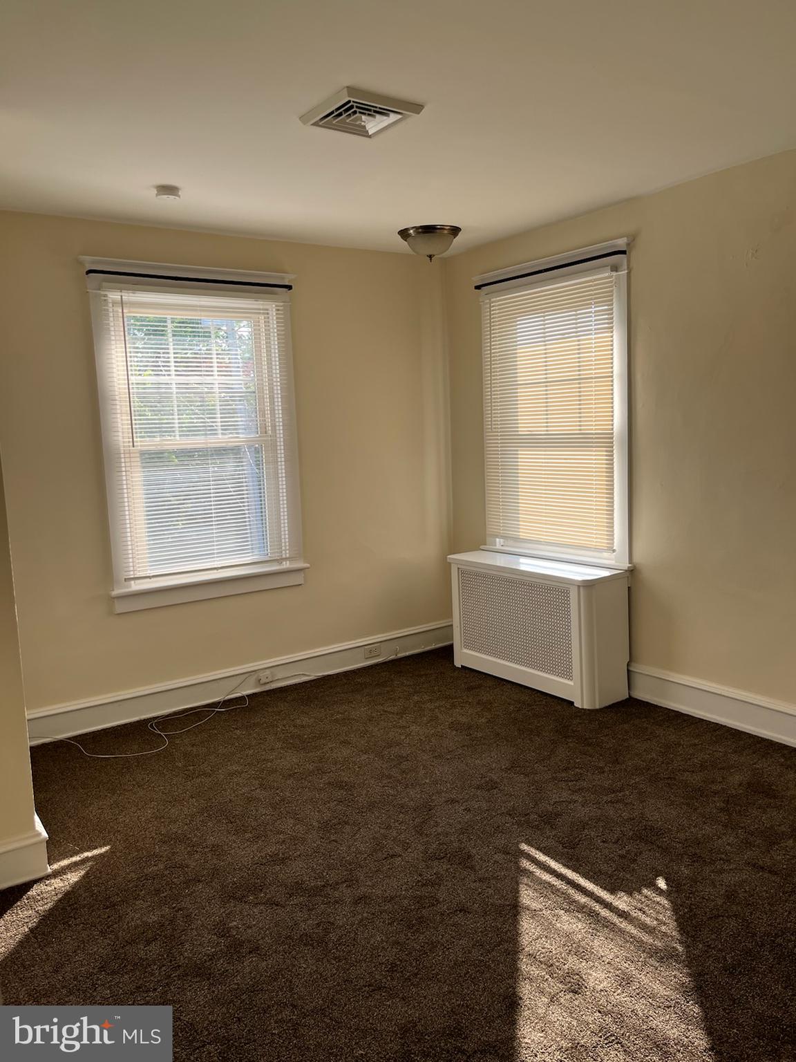 2317 Jenkintown Road Glenside, PA 19038 - Photo 16 of 16 a view of an empty room with a window