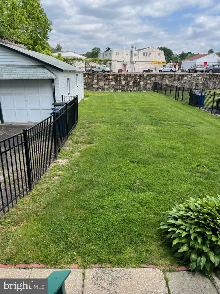 2317 Jenkintown Road Glenside, PA 19038 - Photo 7 of 16 a backyard of a house with lots of green space