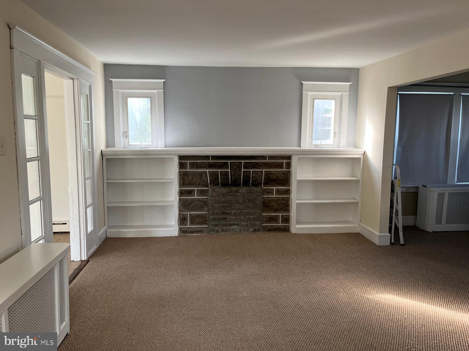 2317 Jenkintown Road Glenside, PA 19038 - Photo 10 of 16 a view of room with walk in closet and window