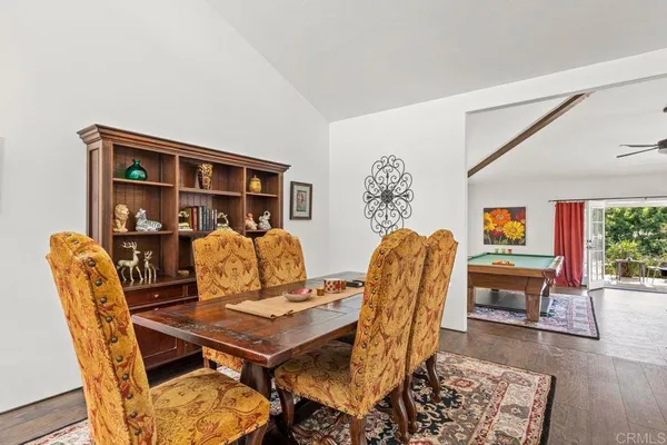 a view of a dining room with furniture