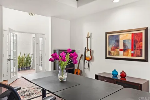 a view of a house with a sink and wooden floor