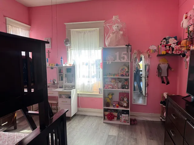 a room with furniture and window