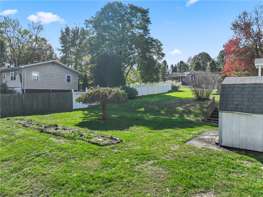 122 Georgetown Road Beaver Falls, PA 15010 - Photo 11 of 44 a view of a backyard with green space
