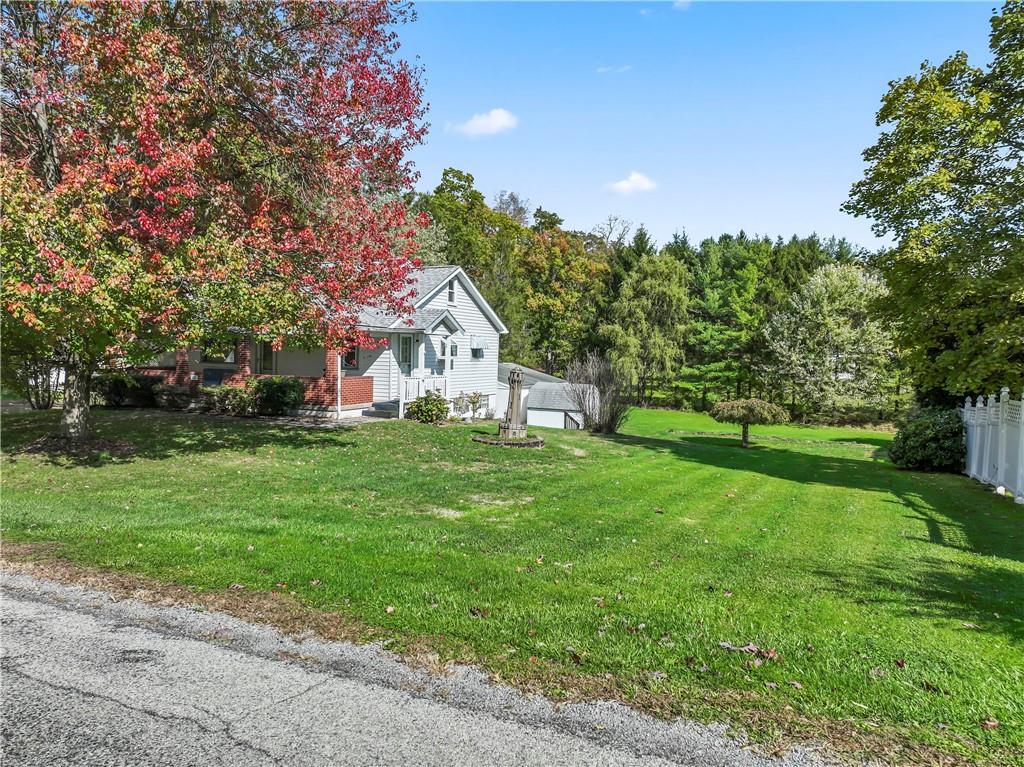 122 Georgetown Road Beaver Falls, PA 15010 - Photo 12 of 44 a view of house with yard and green space