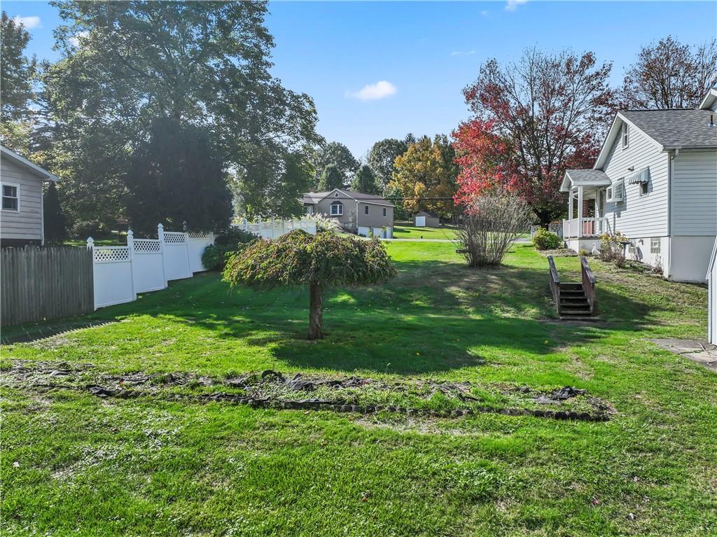 122 Georgetown Road Beaver Falls, PA 15010 - Photo 14 of 44 a view of a backyard with a garden
