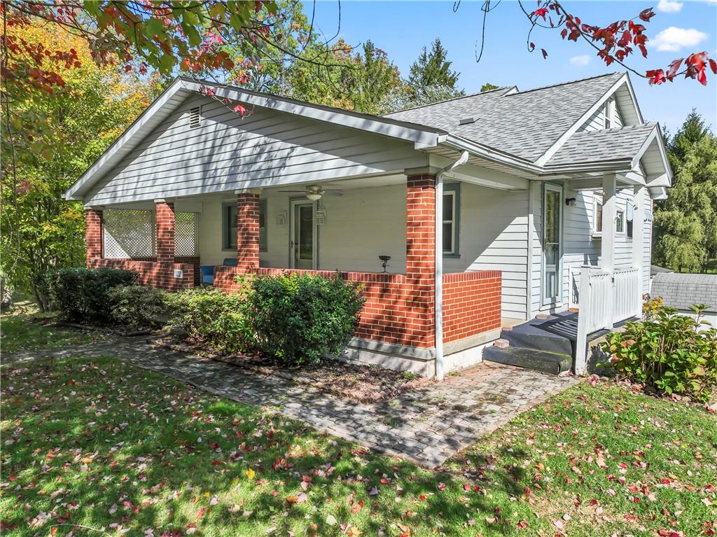 122 Georgetown Road Beaver Falls, PA 15010 - Photo 2 of 44 front view of a house with a porch