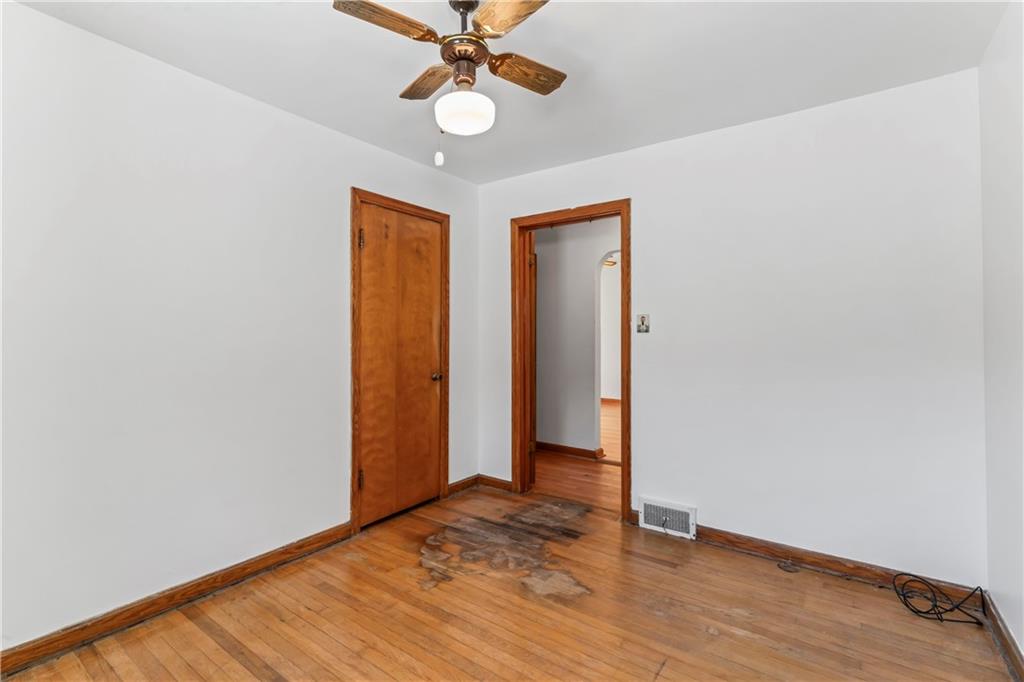 122 Georgetown Road Beaver Falls, PA 15010 - Photo 27 of 44 a view of an empty room with wooden floor