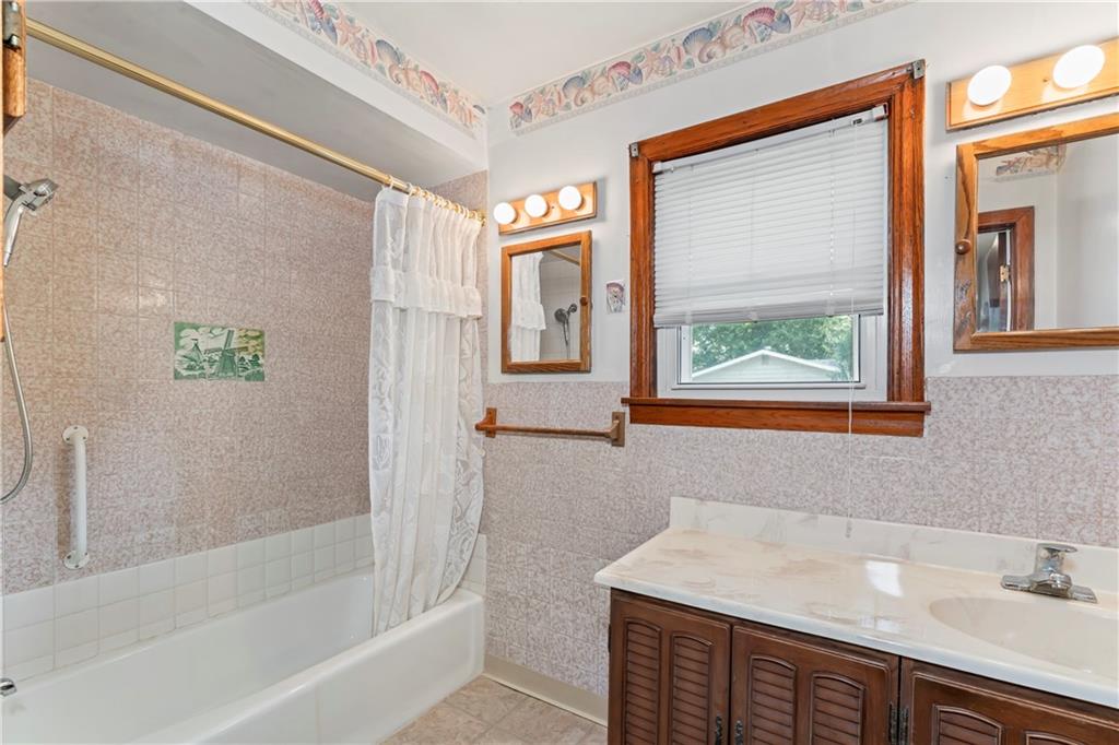 122 Georgetown Road Beaver Falls, PA 15010 - Photo 28 of 44 a bathroom with a sink and a bathtub