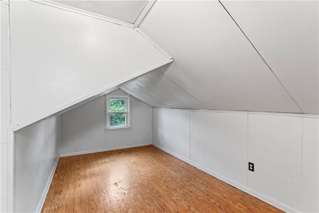 122 Georgetown Road Beaver Falls, PA 15010 - Photo 31 of 44 a view of room with window and wooden floor