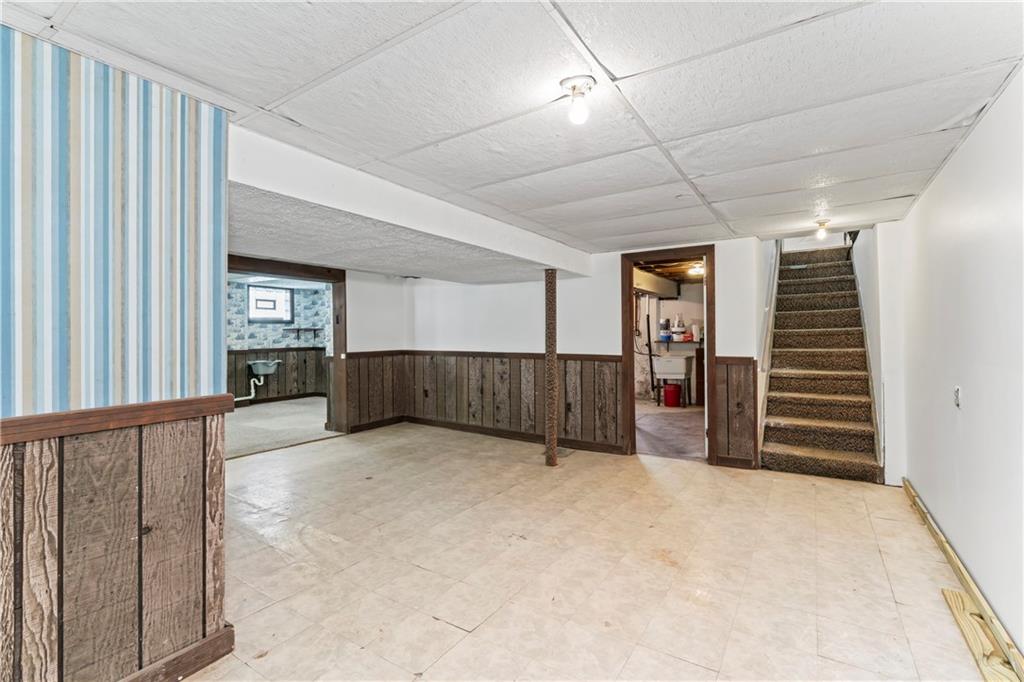 122 Georgetown Road Beaver Falls, PA 15010 - Photo 34 of 44 a view of an empty room with stairs