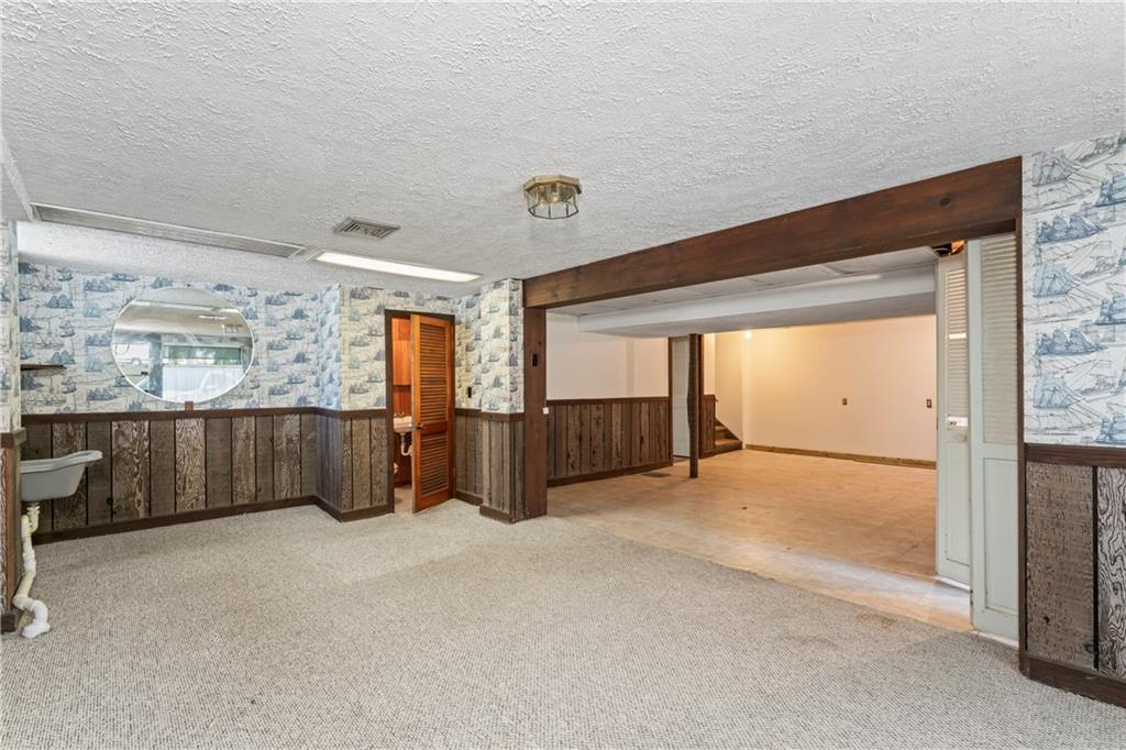 122 Georgetown Road Beaver Falls, PA 15010 - Photo 37 of 44 a view of an empty room with a window