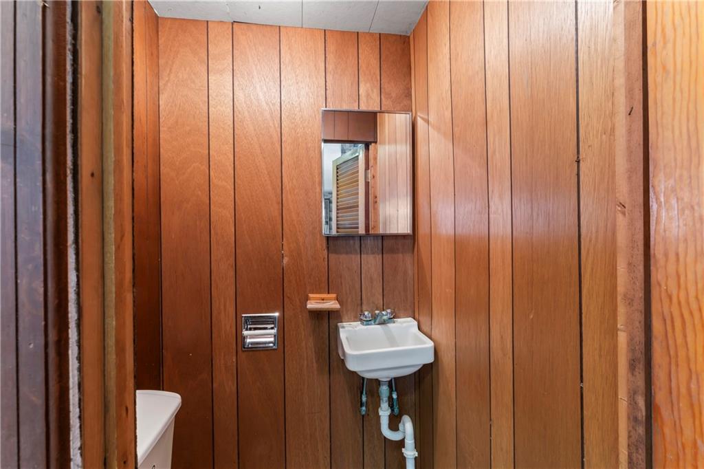 122 Georgetown Road Beaver Falls, PA 15010 - Photo 38 of 44 a bathroom with a sink and a mirror