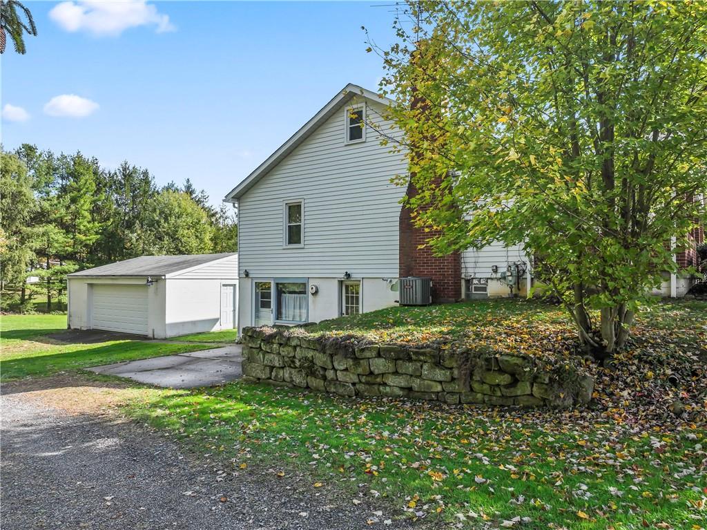 122 Georgetown Road Beaver Falls, PA 15010 - Photo 5 of 44 a house view with a garden space