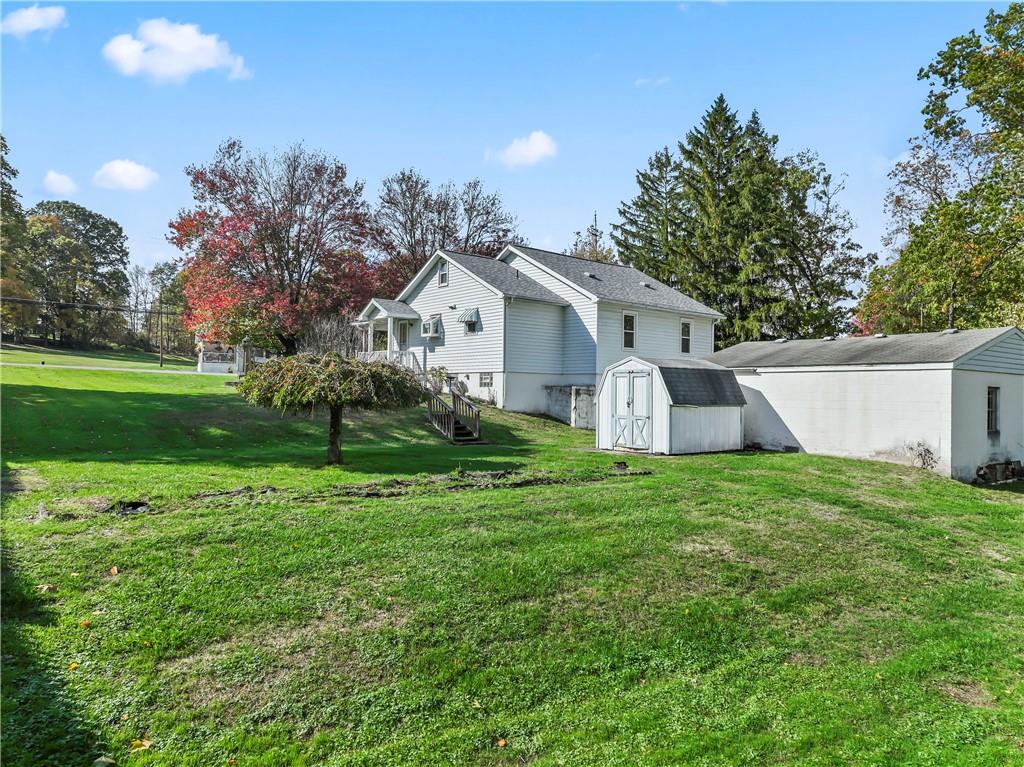 122 Georgetown Road Beaver Falls, PA 15010 - Photo 7 of 44 a view of a house with a big yard plants and large trees