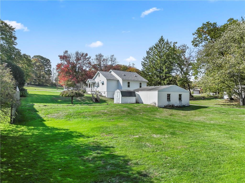 122 Georgetown Road Beaver Falls, PA 15010 - Photo 8 of 44 a front view of house with yard and trees