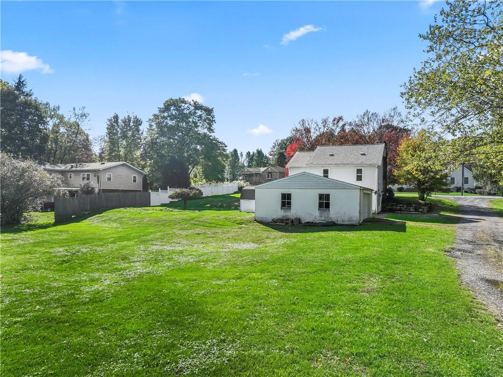 122 Georgetown Road Beaver Falls, PA 15010 - Photo 9 of 44 a view of a house with a yard and sitting area