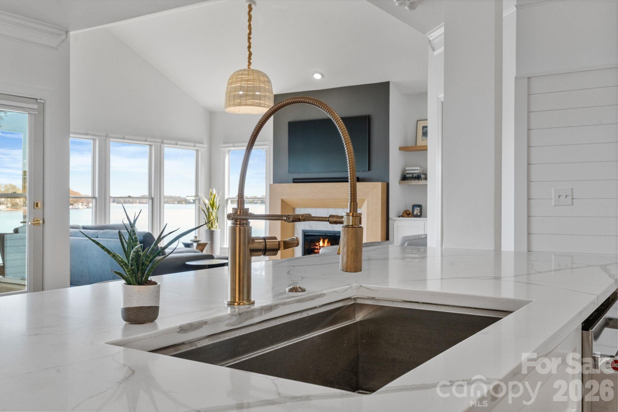 17723 Springwinds Drive Cornelius, NC 28031 - Photo 15 of 34 a view of a kitchen with a sink and faucet