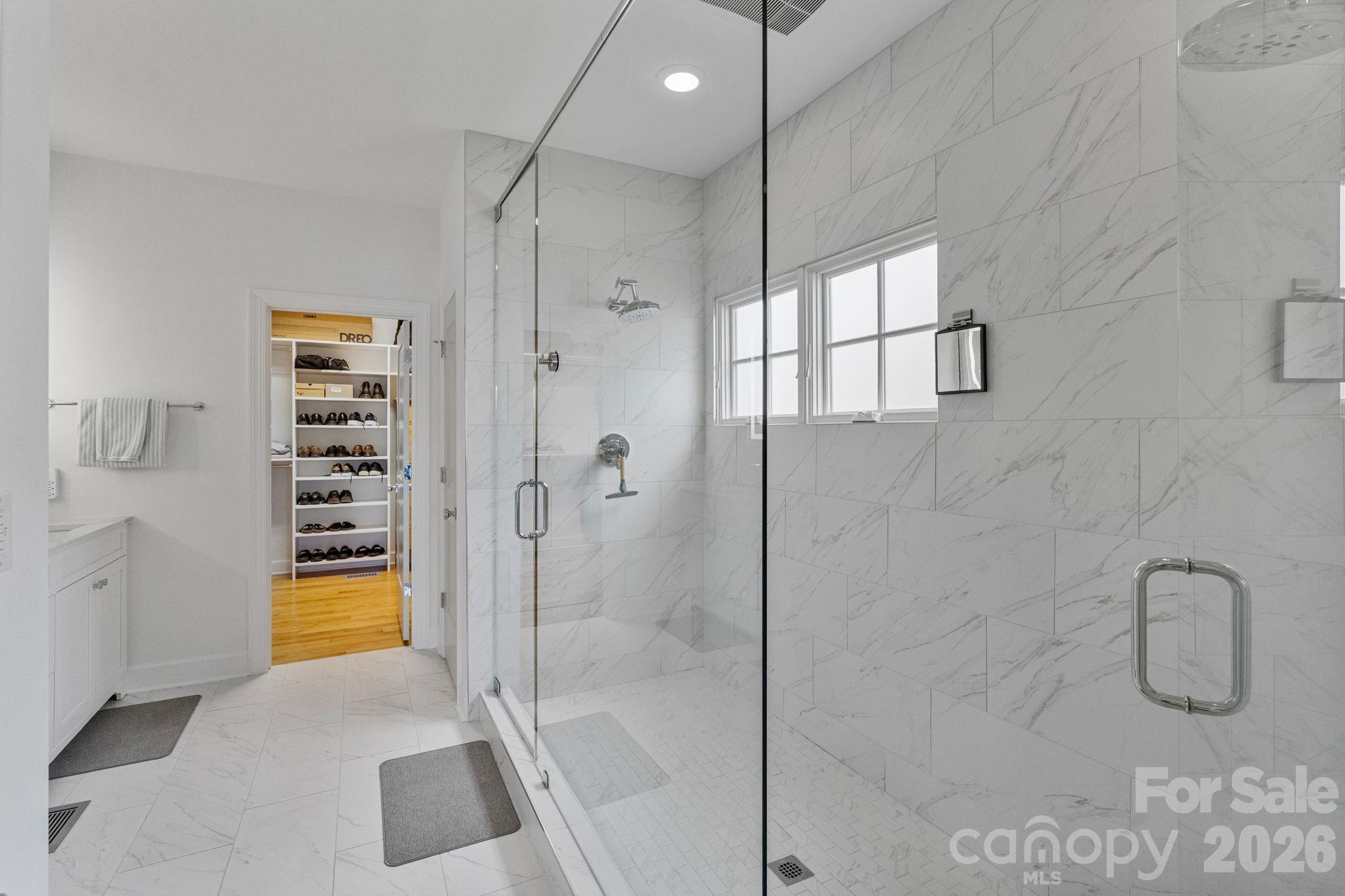 17723 Springwinds Drive Cornelius, NC 28031 - Photo 21 of 34 a bathroom with a shower