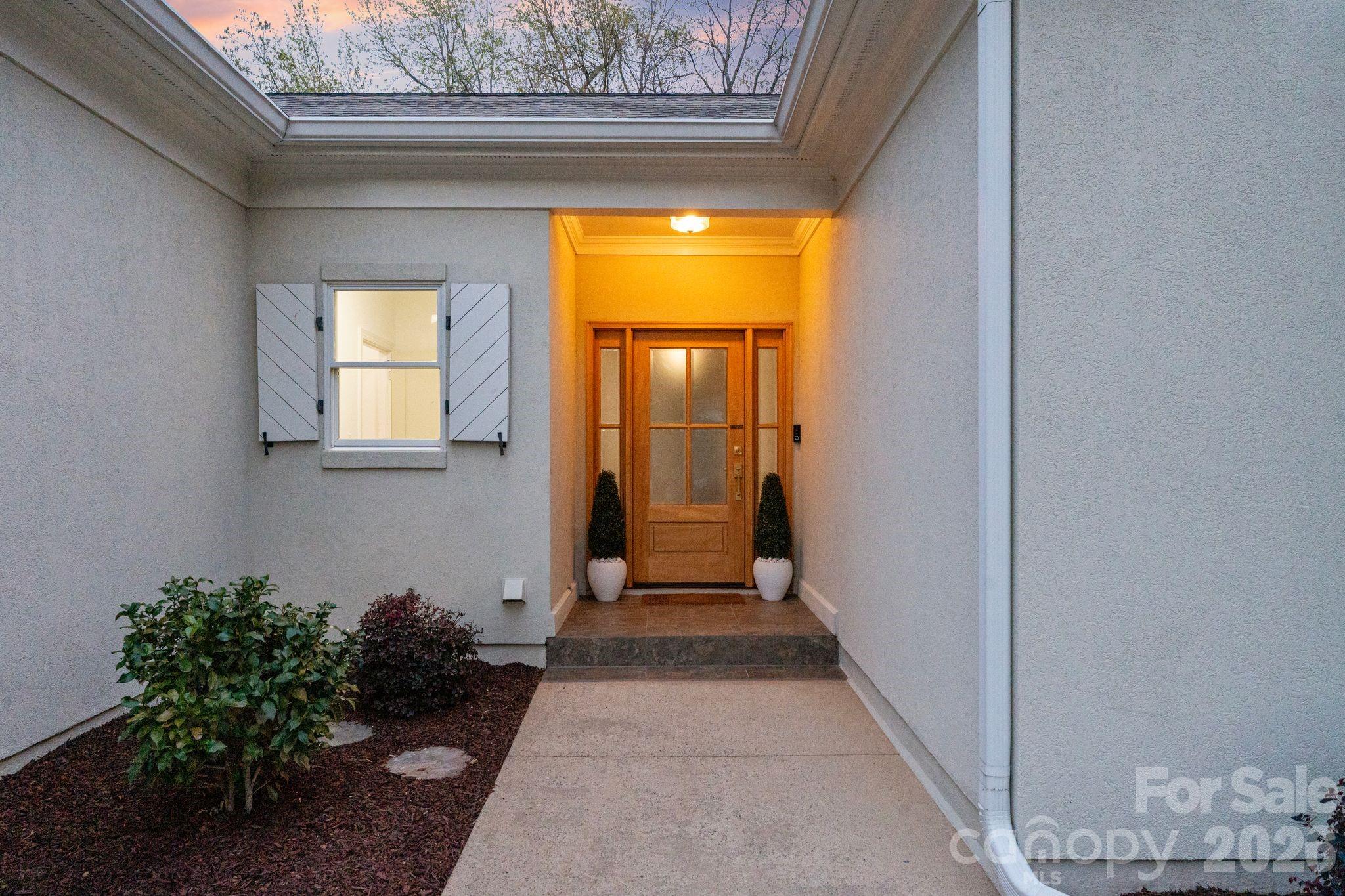 17723 Springwinds Drive Cornelius, NC 28031 - Photo 3 of 34 a view of an entryway of a house