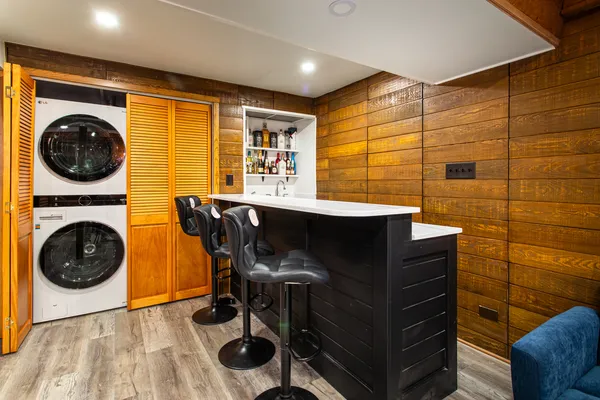 a view of a kitchen with a sink and cabinets