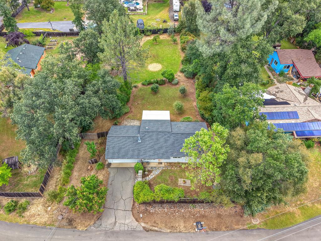 6689 Rhodes Avenue Placerville, CA 95667 - Photo 5 of 60 an aerial view of a house with a yard and lake view